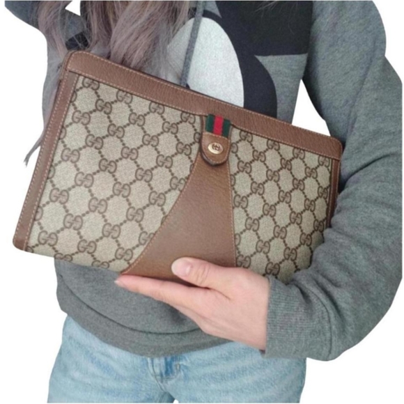 Gucci Handbags - NWOT Authentic Vintage Gucci Clutch
